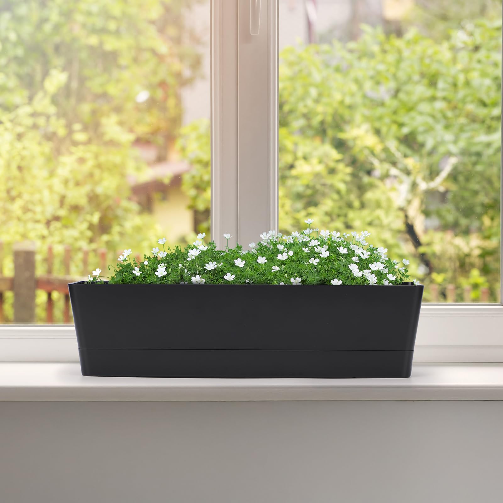 GREANER on a balcony railing styled with succulents for decorative curb appeal
