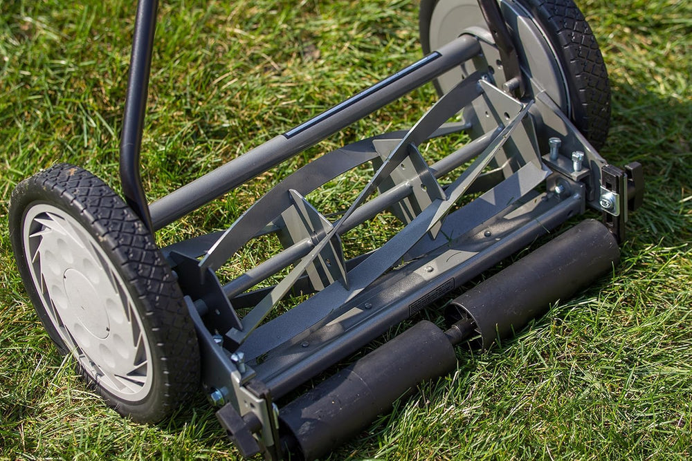 Great States mower beside a ruler showing 16-inch cutting width for scale and coverage