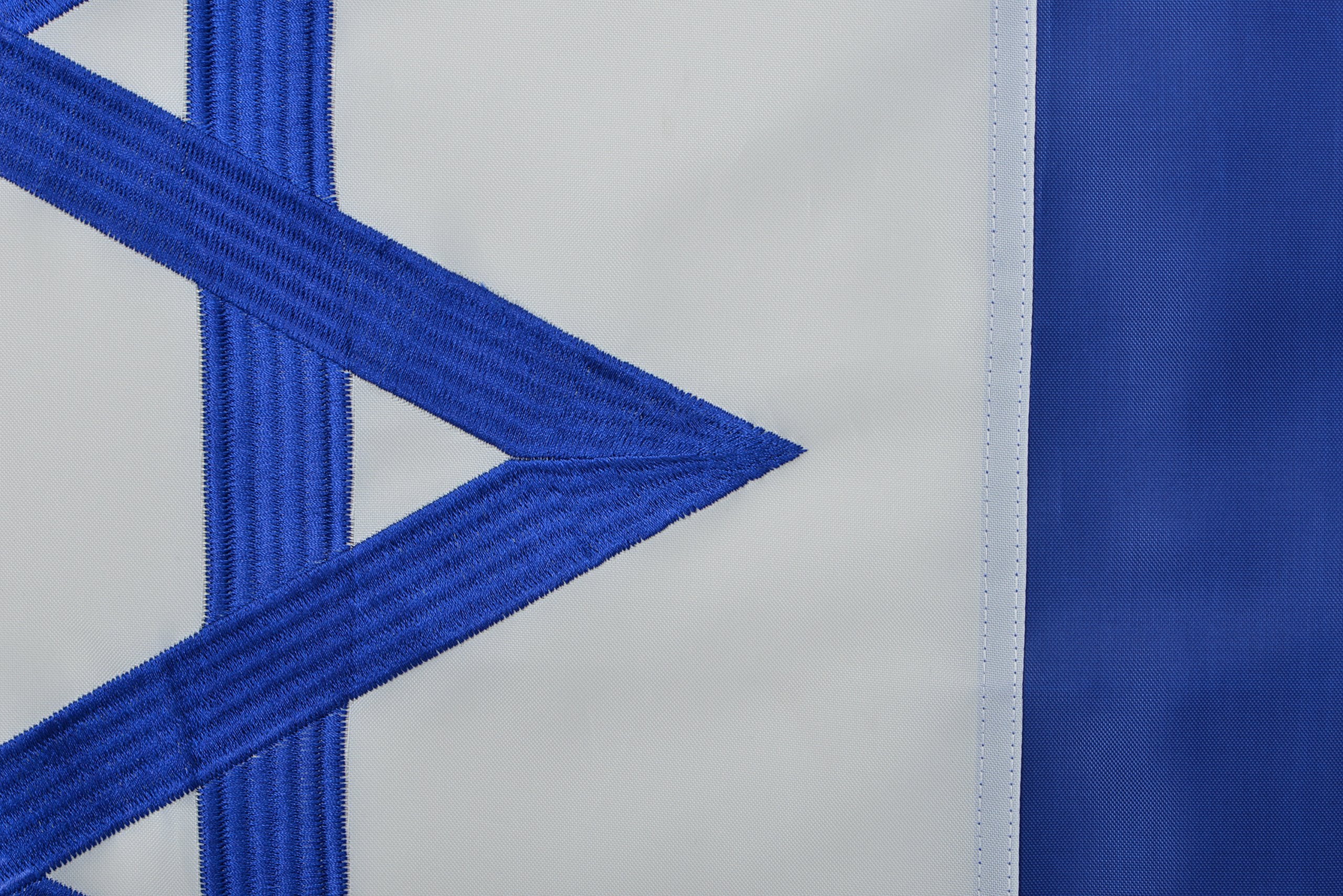 Green Grove embroidered close-up showing Star of David detail and durable texture benefit