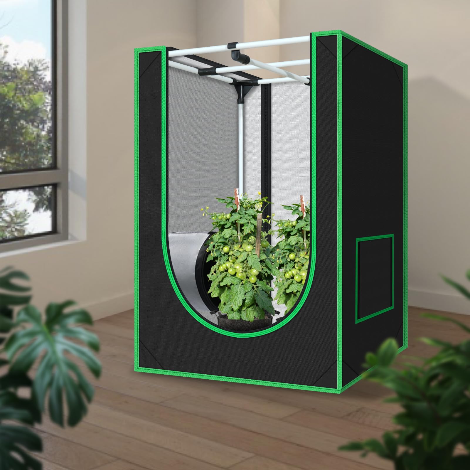 Green Hut open door interior showing reflective Mylar improving light efficiency