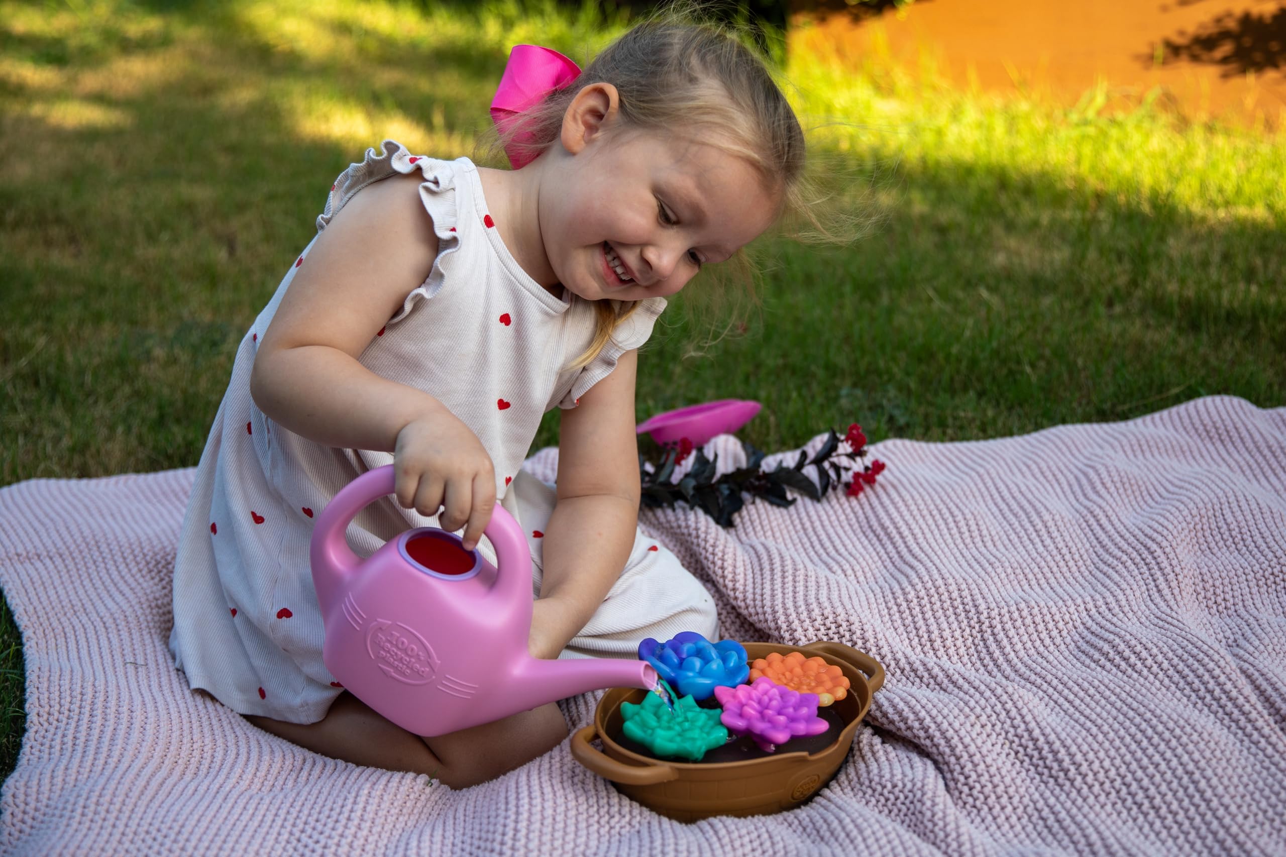 Green Toys set in outdoor lifestyle play showing durable eco-friendly fun benefit