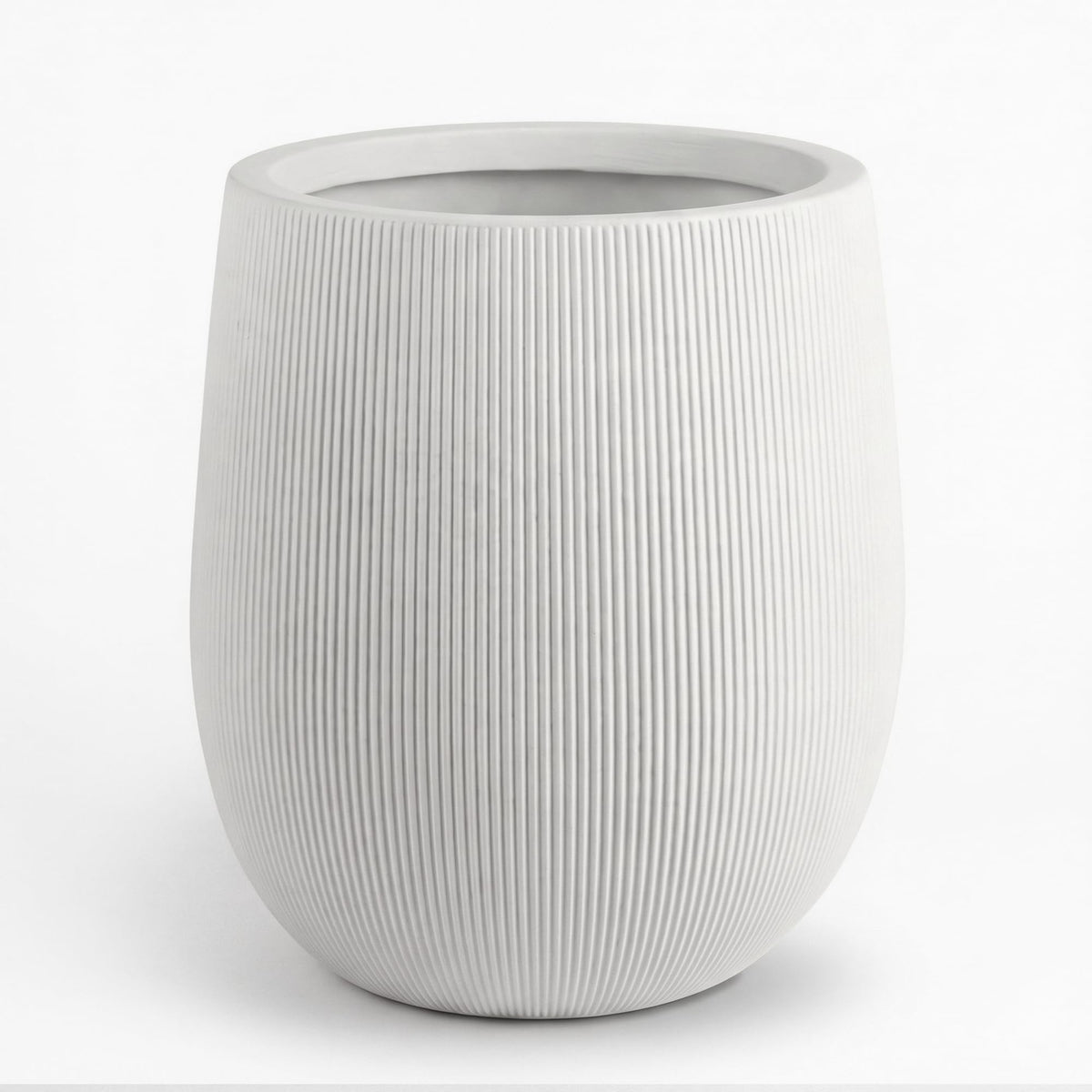 Greens Word front view of white planter showing modern ribbed design and visual appeal