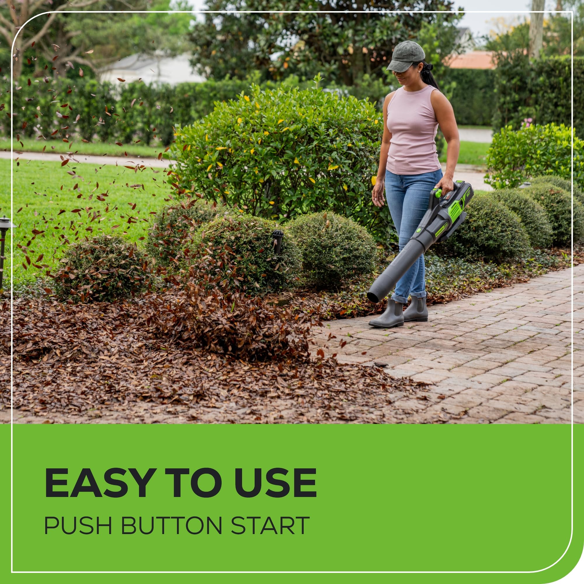 Greenworks handle and controls visible for ergonomic comfort and easy speed control