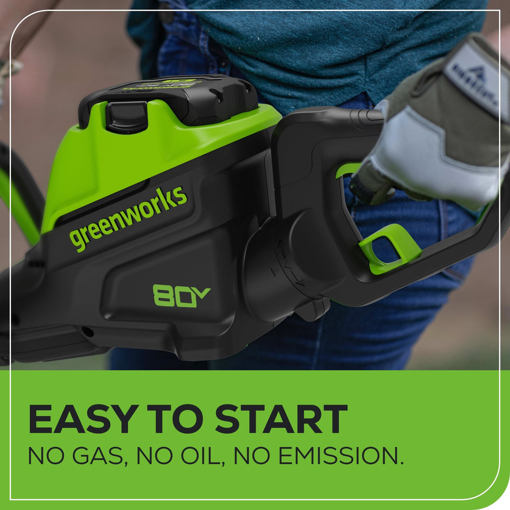 Greenworks trimmer with 2.0Ah battery attached for extended runtime