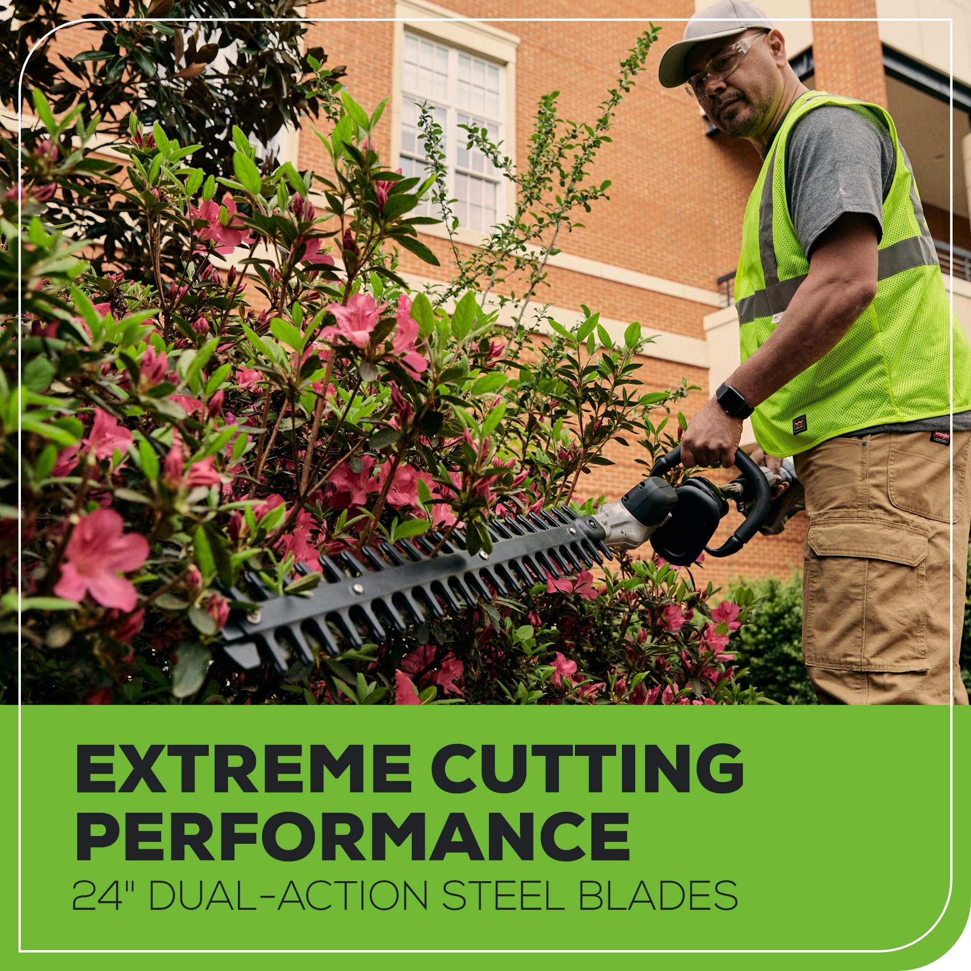 Greenworks 82V being used trimming a hedge showing reduced vibration benefit