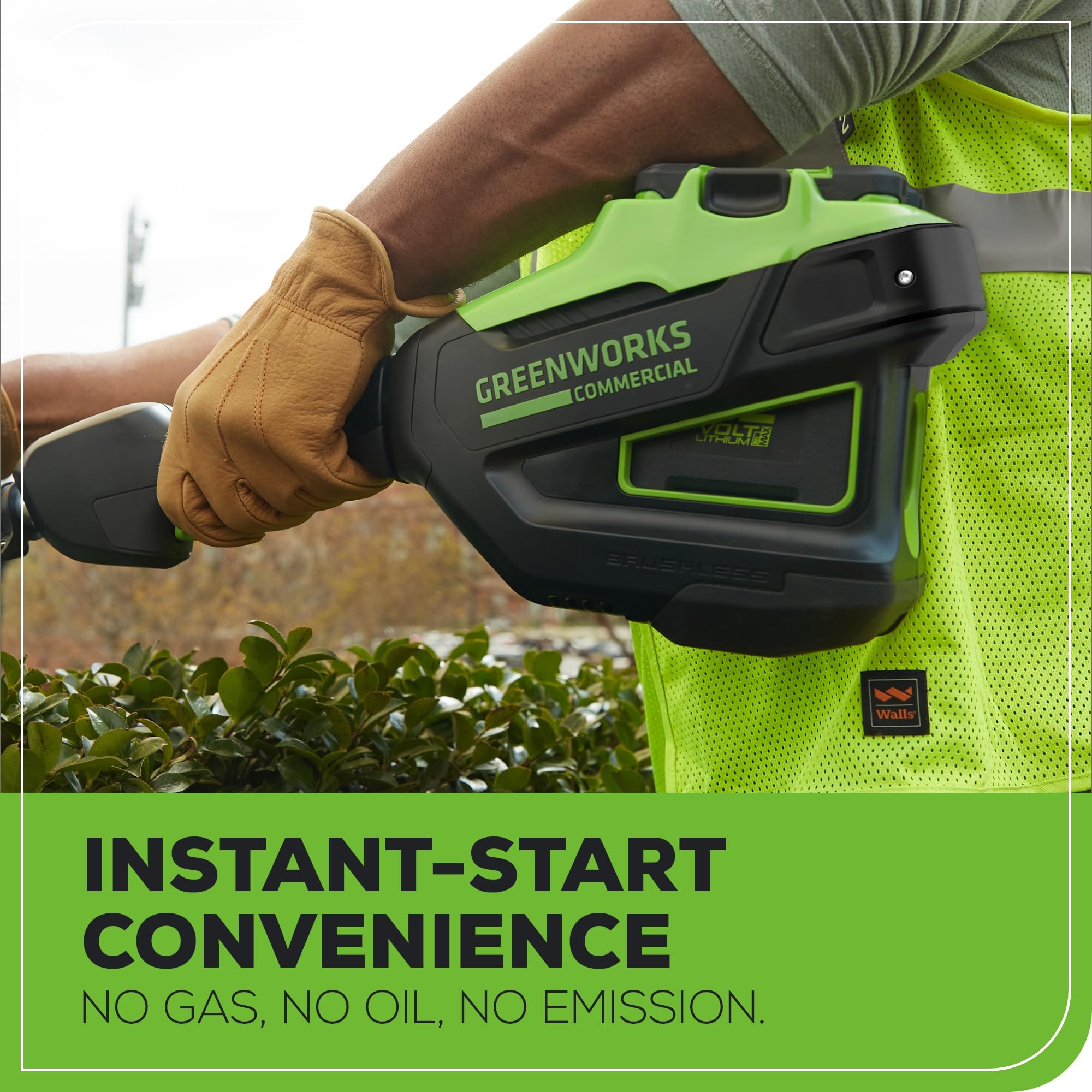 Greenworks 82V 30-inch shaft beside measuring tape showing extended reach benefit
