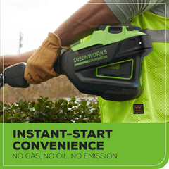 Greenworks 82V 30-inch shaft beside measuring tape showing extended reach benefit