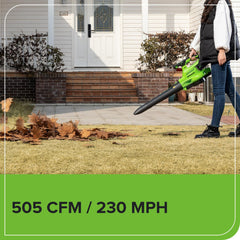 Greenworks 5.0Ah battery inserted with charger showing quick swap convenience and runtime benefit