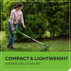 Greenworks held by user trimming grass showing ergonomic grip and control