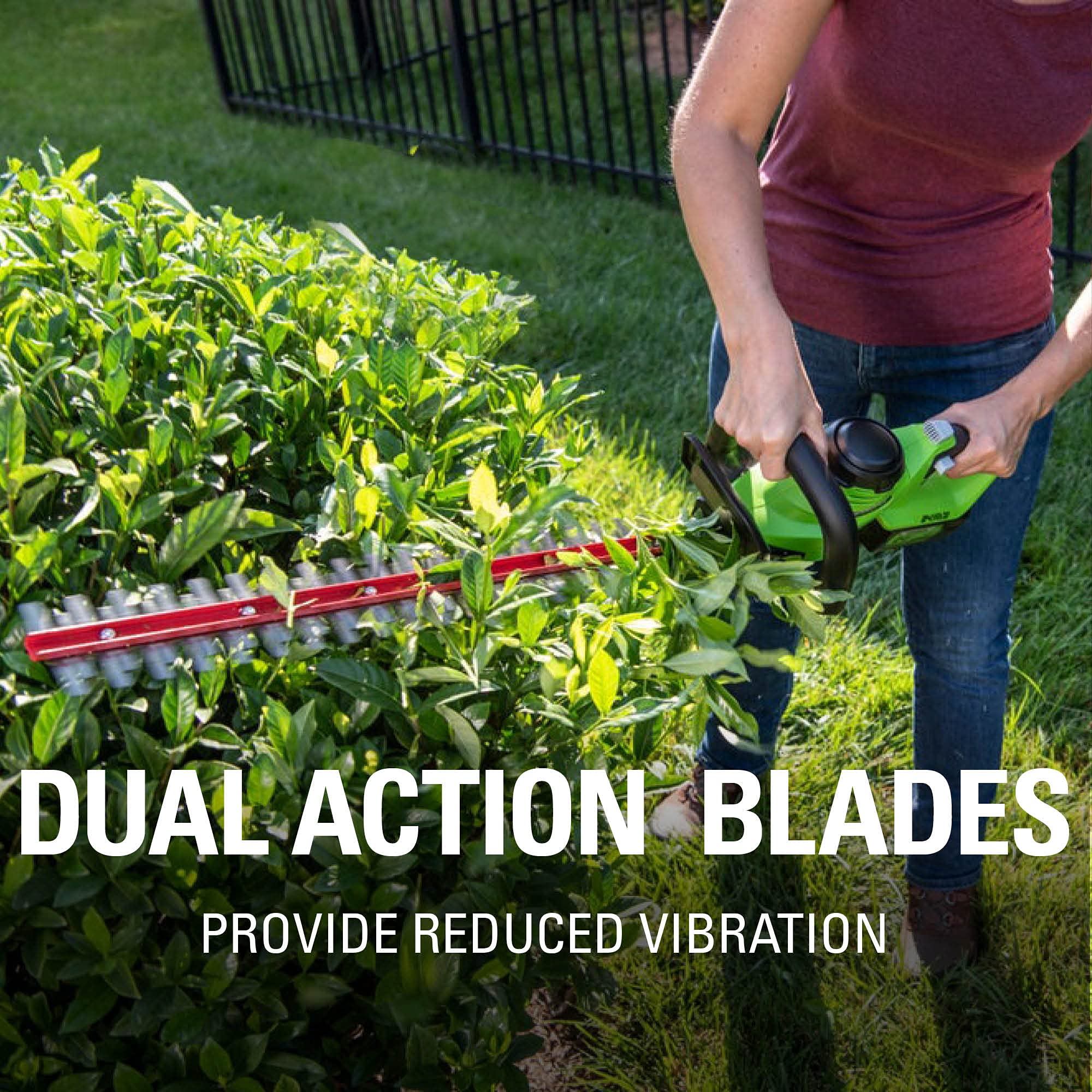 Greenworks trimmer in use shaping a hedge for fast yard maintenance
