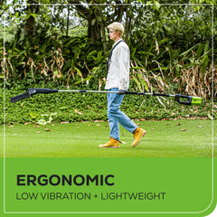 Greenworks polesaw cutting high branch demonstrating safe overhead reach