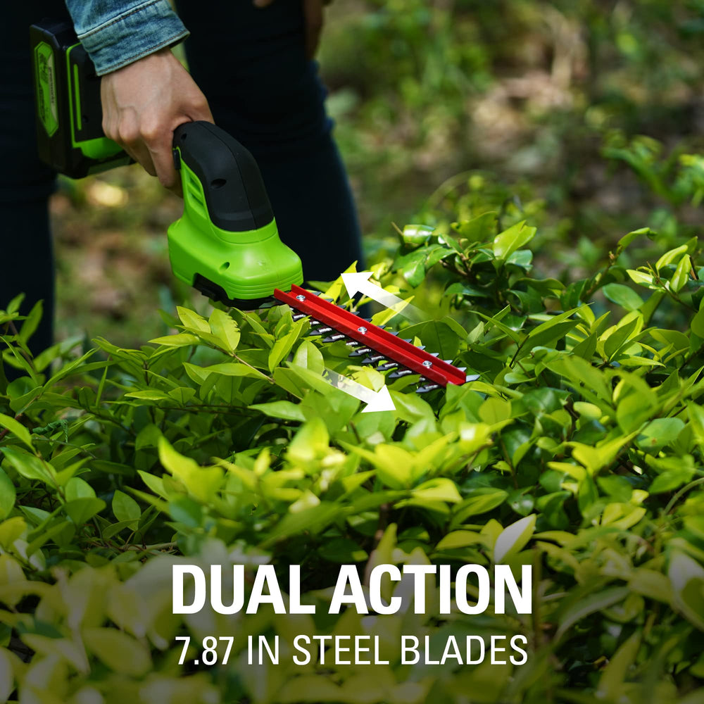 Greenworks shear shrubber trimming lawn edge demonstrating precise control and neat finish