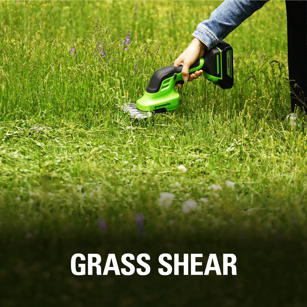 Greenworks shear shrubber pruning ornamental shrub showing efficient detail trimming