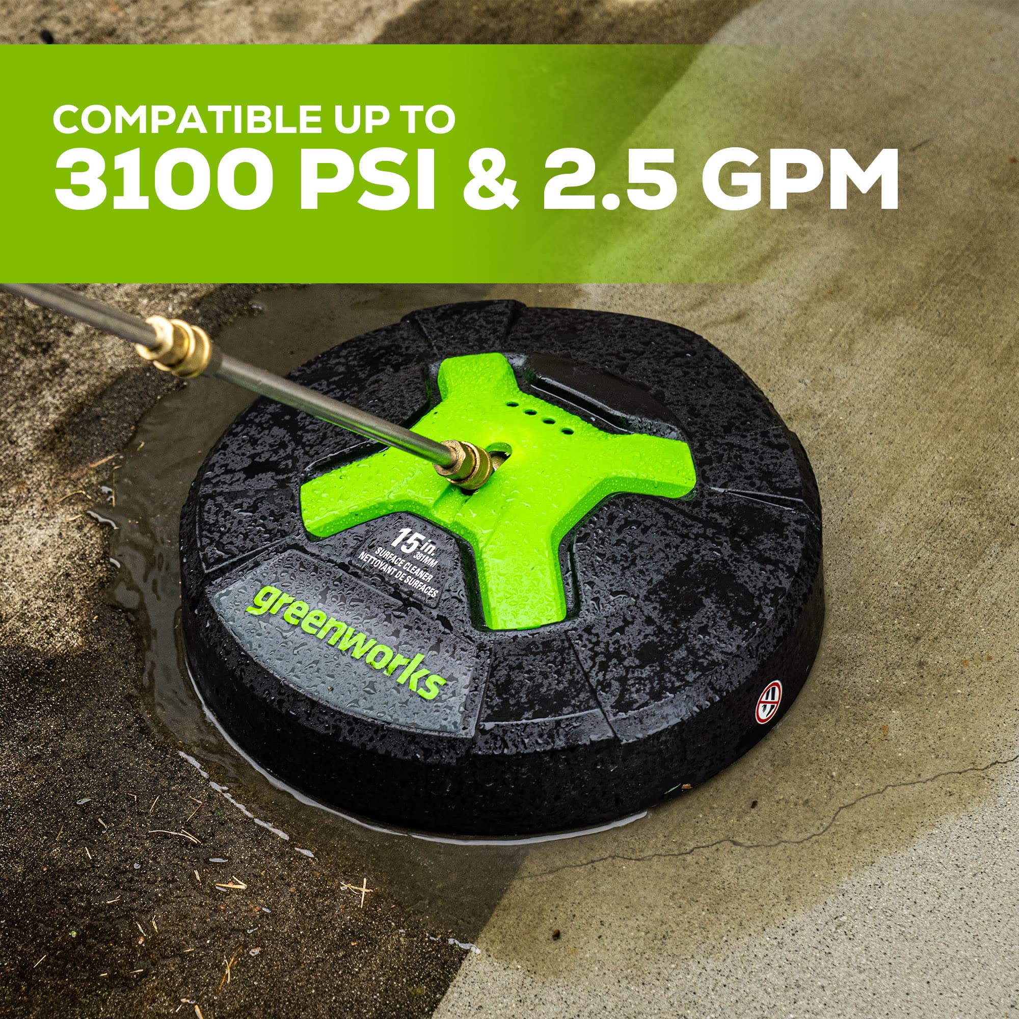 GreenWorks next to a foot for scale illustrating compact 15-inch cleaning width