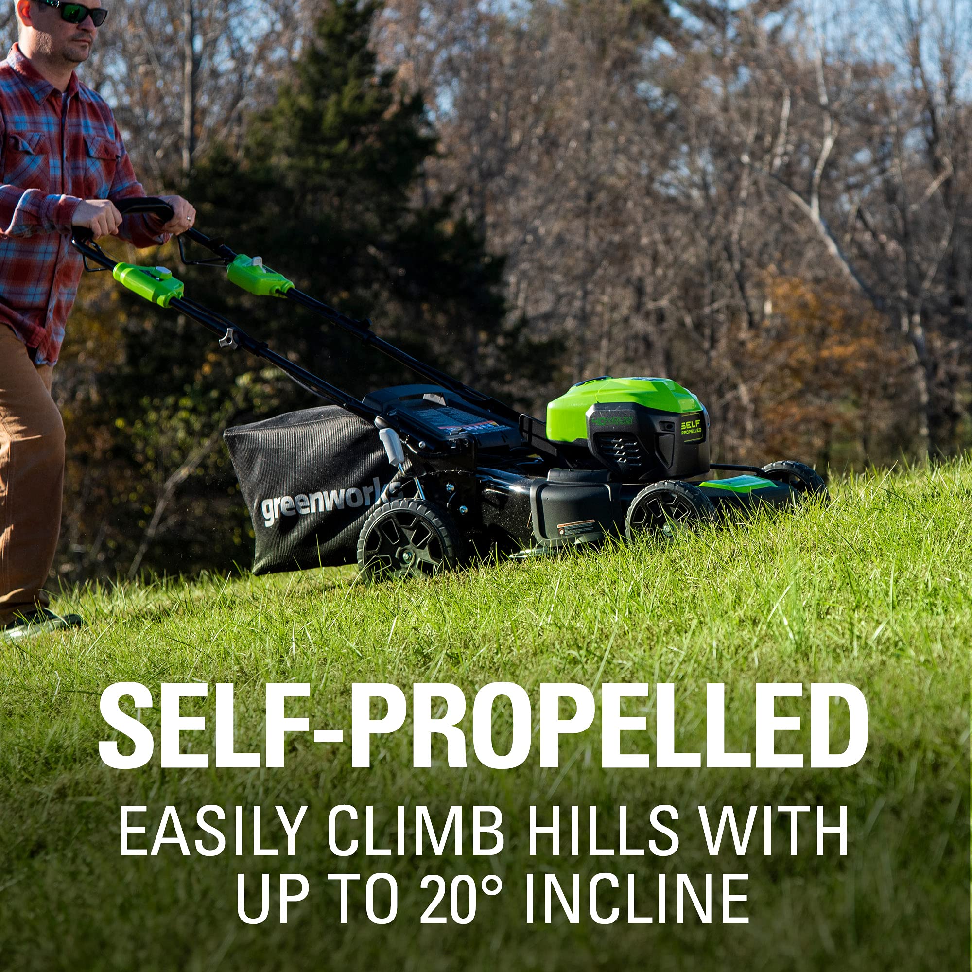 Greenworks mower next to person showing scale and maneuverability