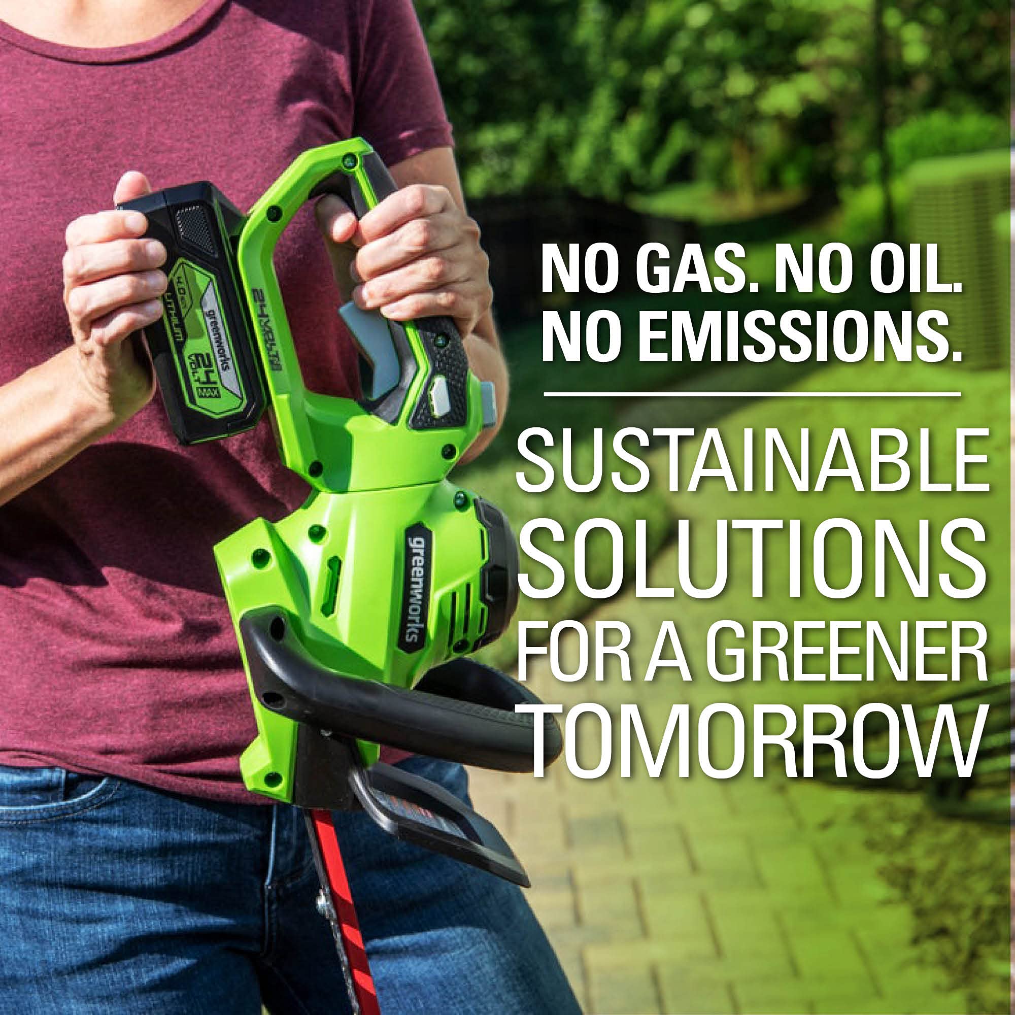 Greenworks stored on a shed wall saving space and protecting blades