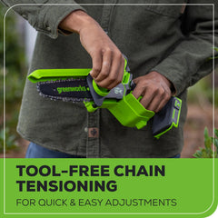 Greenworks mini chainsaw held in hand for scale and easy handling benefit