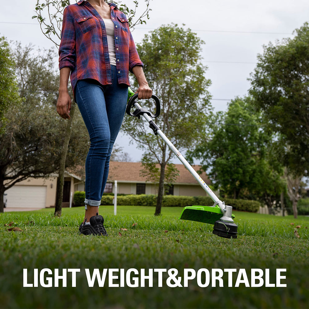 Greenworks trimmer with both 4.0Ah batteries mounted showing longer runtime benefit