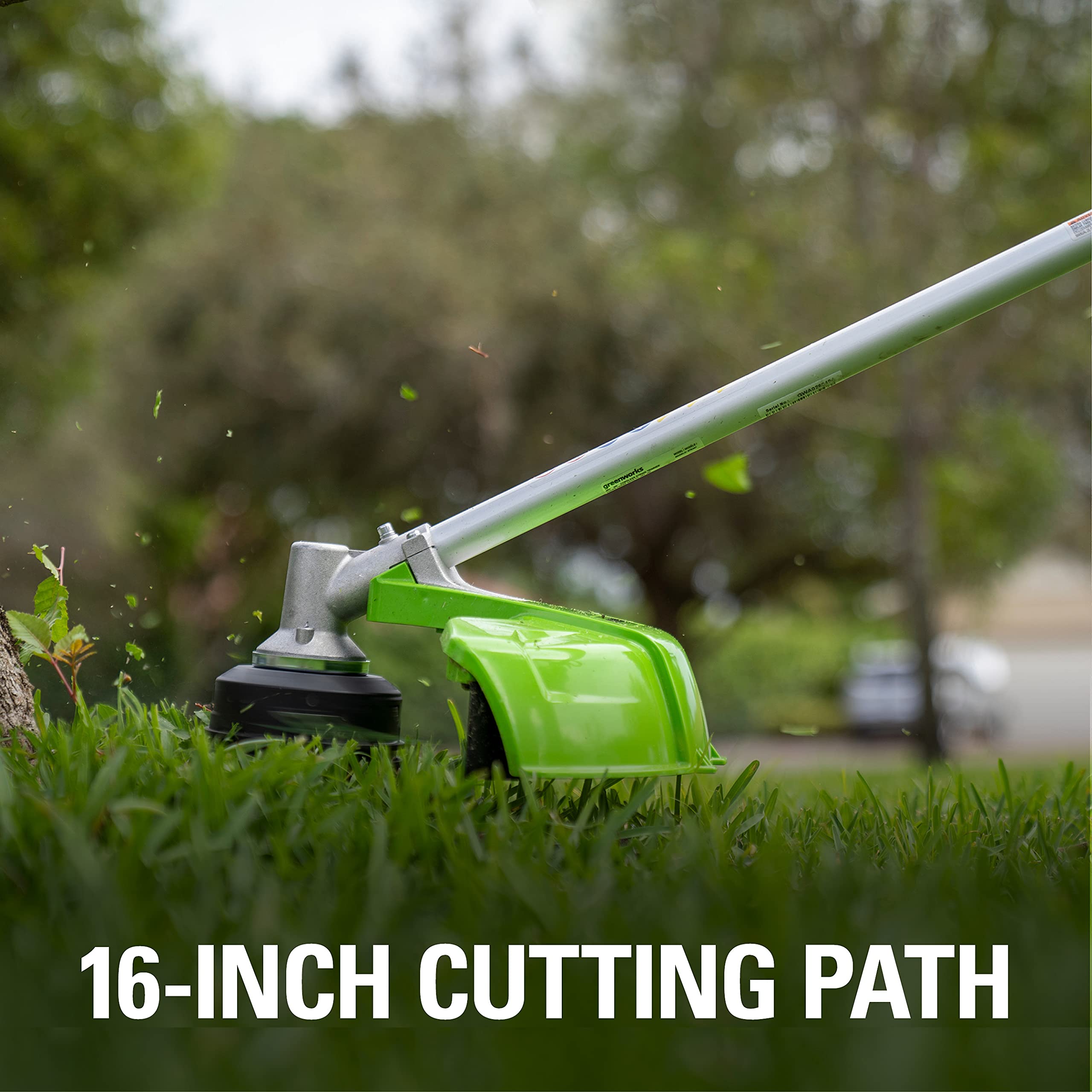 Greenworks close-up of dual-line bump feed head showing quick line advancement benefit