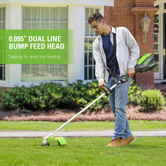 Greenworks trimmer used edging lawn near sidewalk demonstrating cleaner edges and reduced fatigue