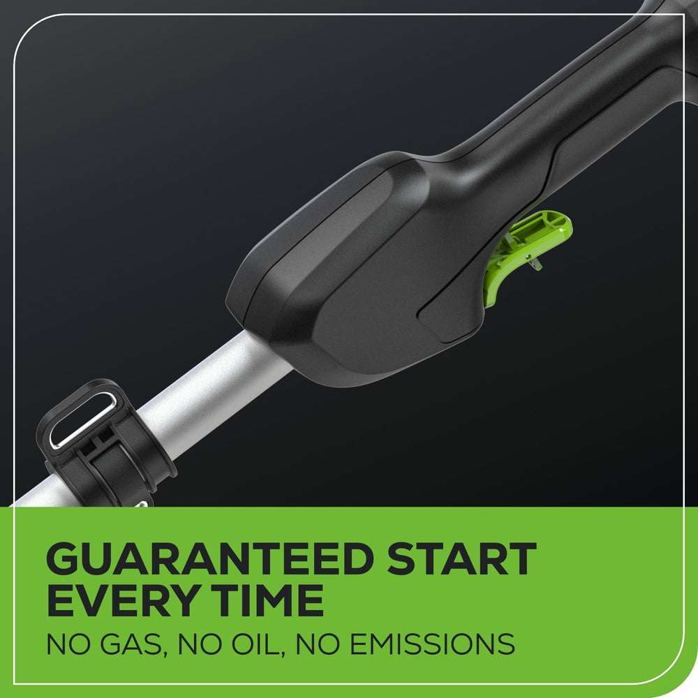 Greenworks pole trimmer in use on tall hedge for safer ground trimming