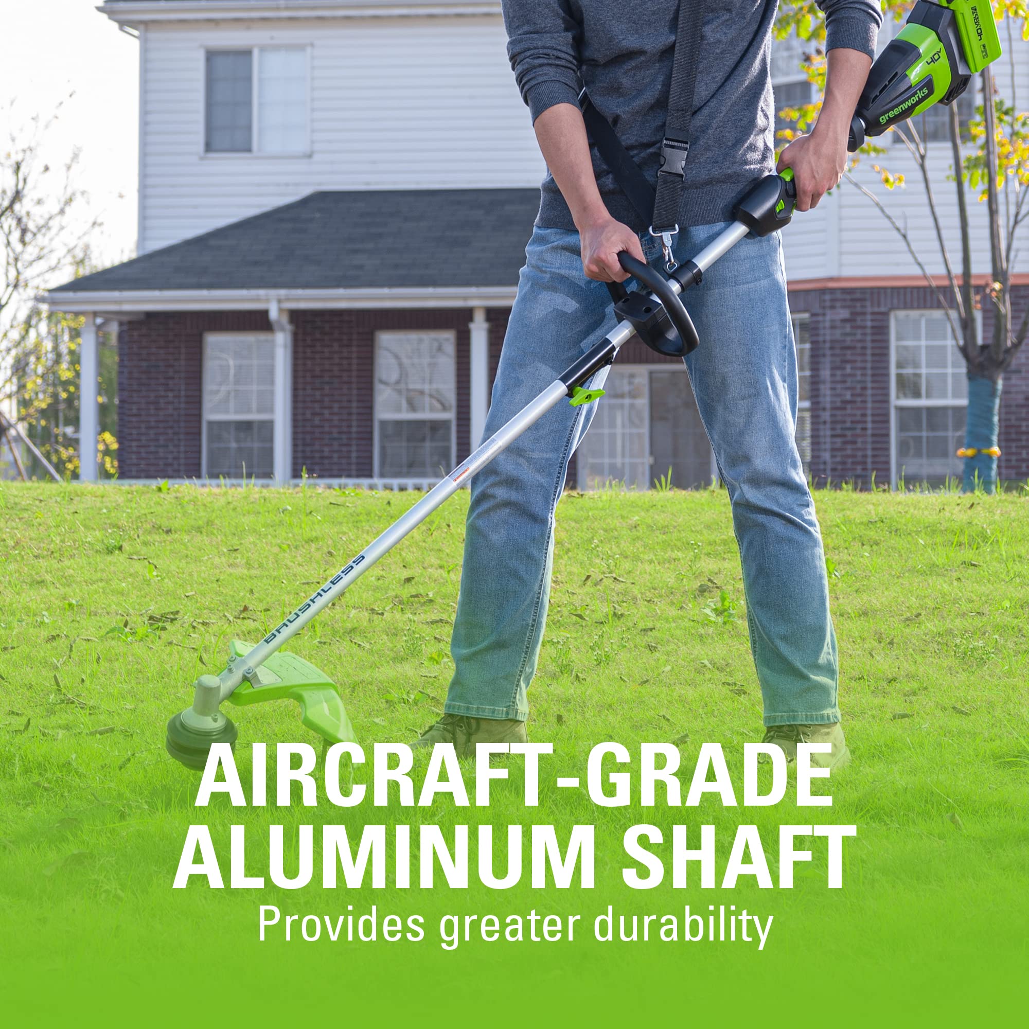 Greenworks trimmer beside ruler showing 16 inch cutting width and scale benefit