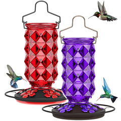 Grete Gotye front view of two glass feeders showing color and shape attracting birds