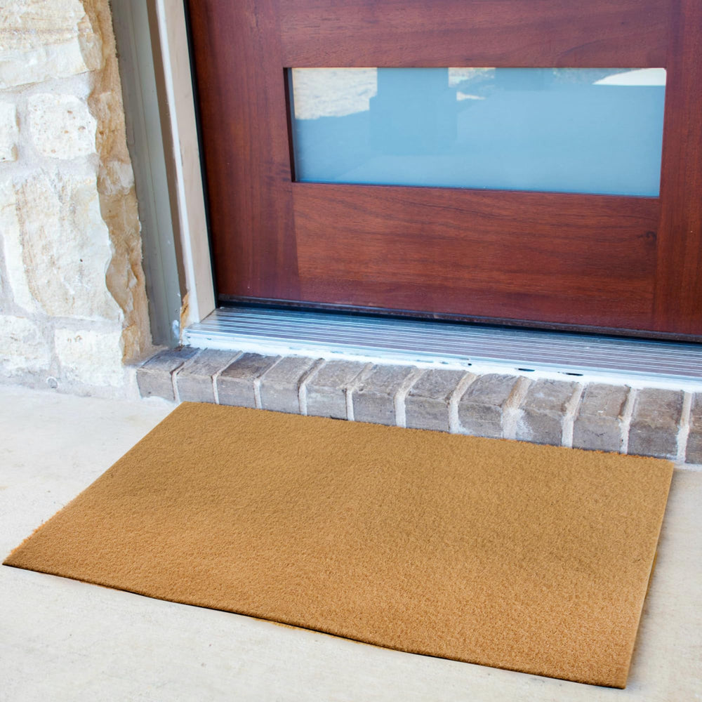 GRETJOB mat beside door to show 30 by 17 inch size and fit