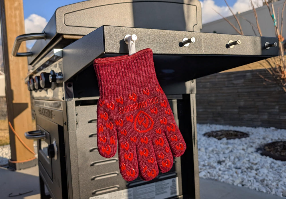 Grill Armor gloves beside a ruler showing size and fit for scale and fit reference