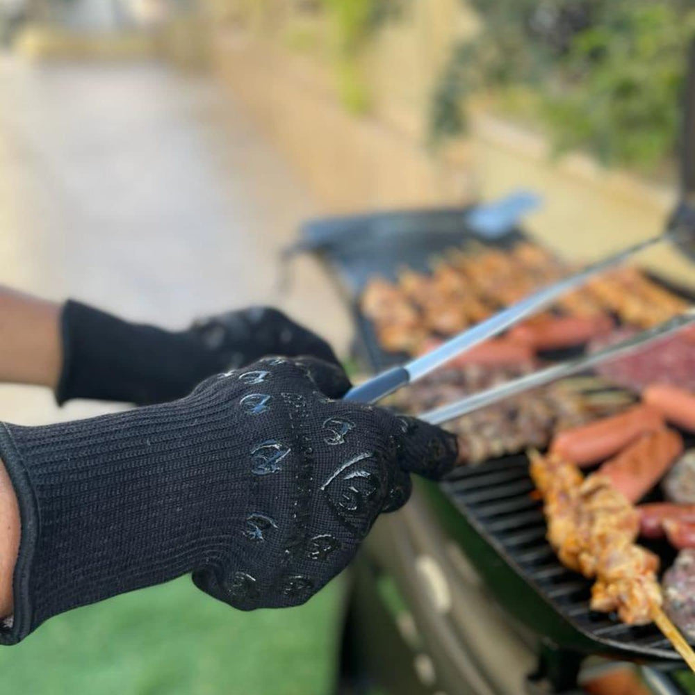 Grill Armor extra long cuff protecting forearm from radiant heat