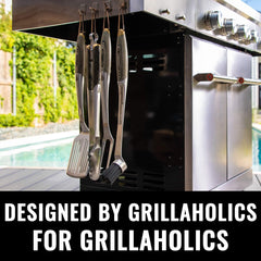Grillaholics carving fork holding roast with ruler for size and serving accuracy