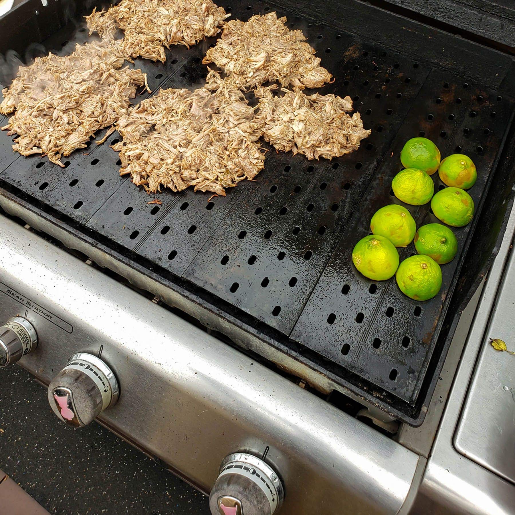 GrillGrate GrateTool detail with handle showing safer, easier scraping benefit