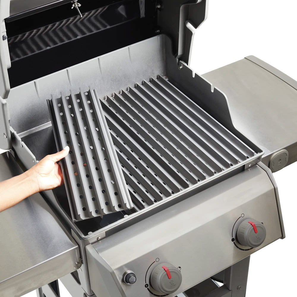 GrillGrate panels with booklet in packaging showing included tips and ready-to-use benefit