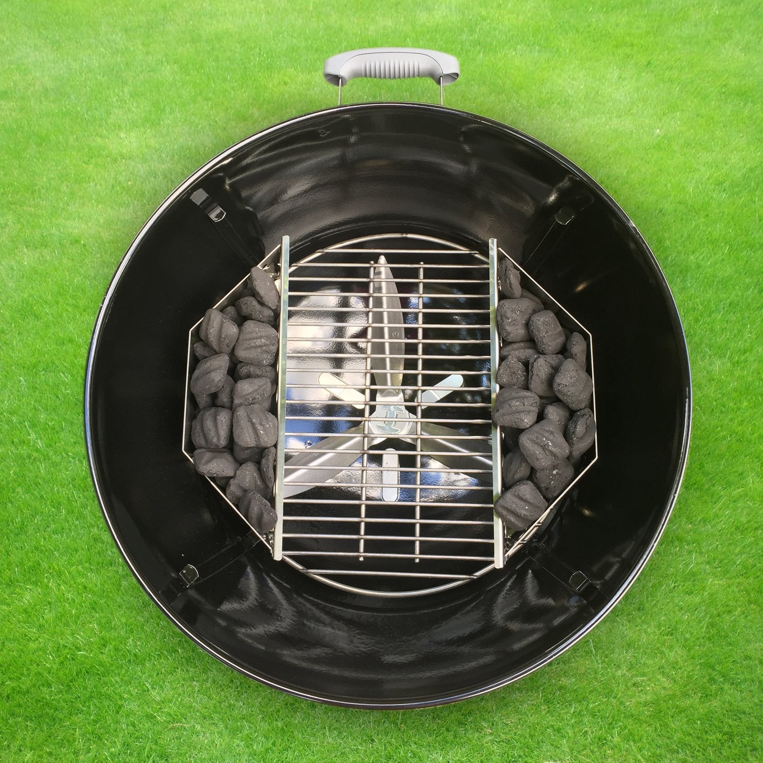 GRILLVANA charcoal basket filled with briquettes for steady burn and simplified fuel management