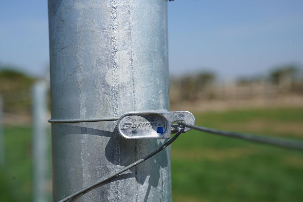 GRIPPLE T-Clip holding barbed wire taut with clear secure termination benefit