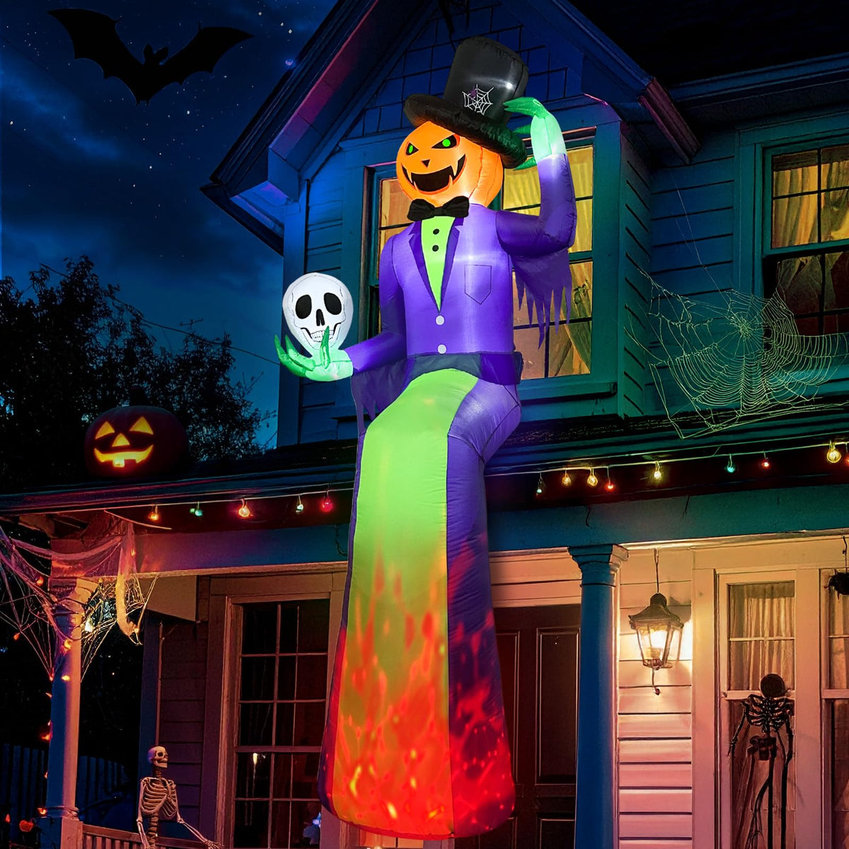 GUDELAK front view of 10ft sitting pumpkin man showing dramatic yard impact