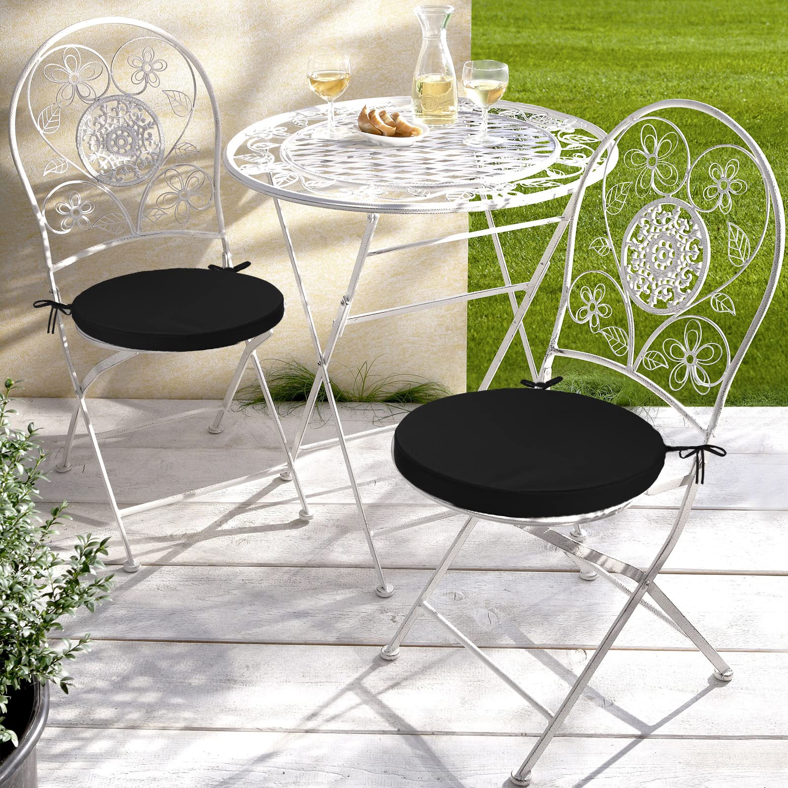 GUEGLSA cushion placed on a bistro chair on a sunny patio adding comfort and style
