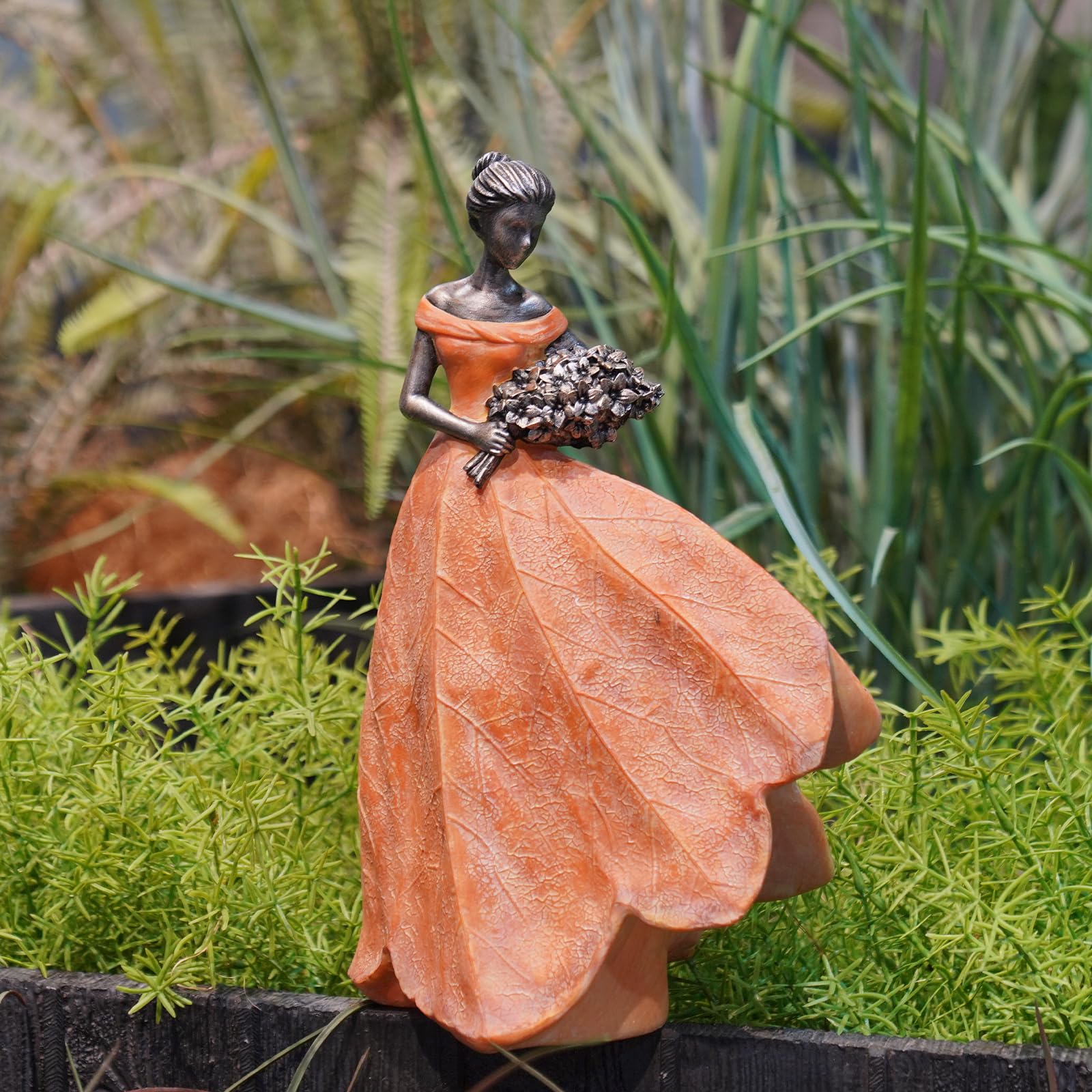 Guichifun lily and bird sculpt details showing symbolic accents and depth