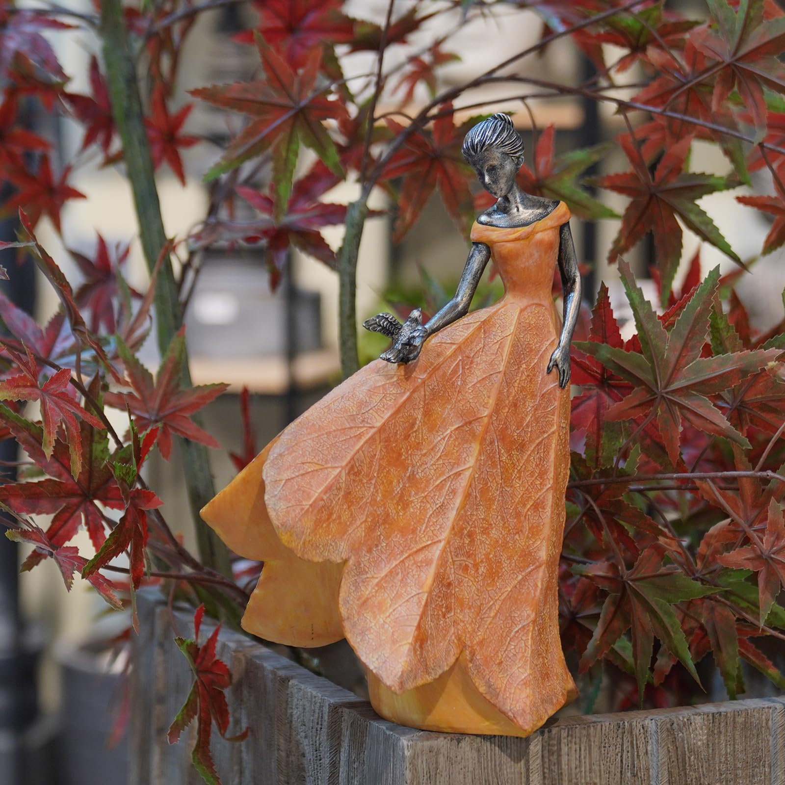 Guichifun side profile with bird in hands showing serene garden charm