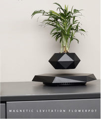GUIYING size comparison with hand to show compact scale and easy placement