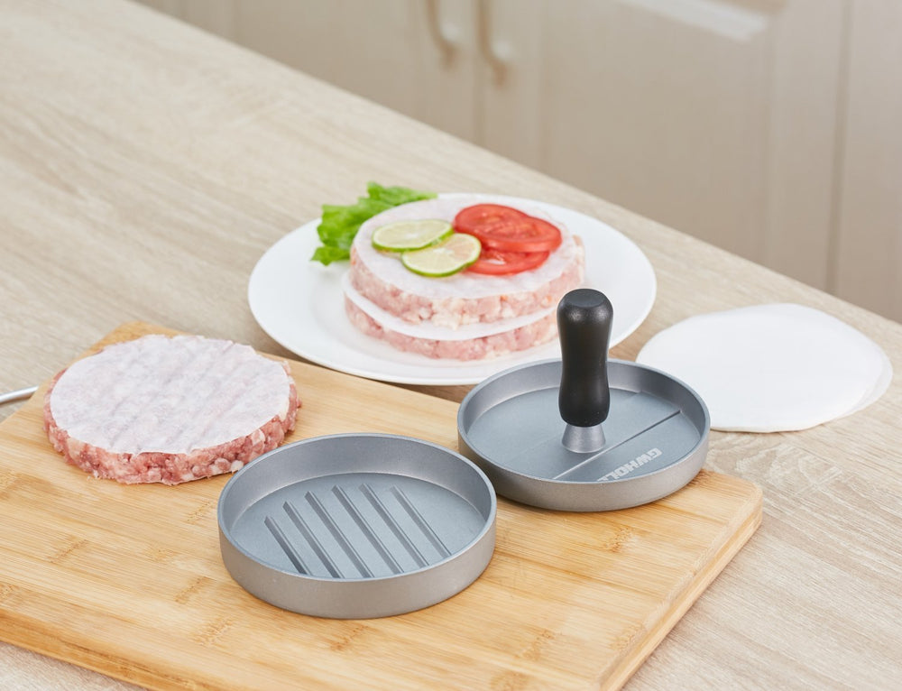 GWHOLE used as roast plate on charcoal grill showing heat-tolerant design