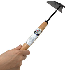 HACHIEMON tool in garden slicing weeds quickly for efficient weeding