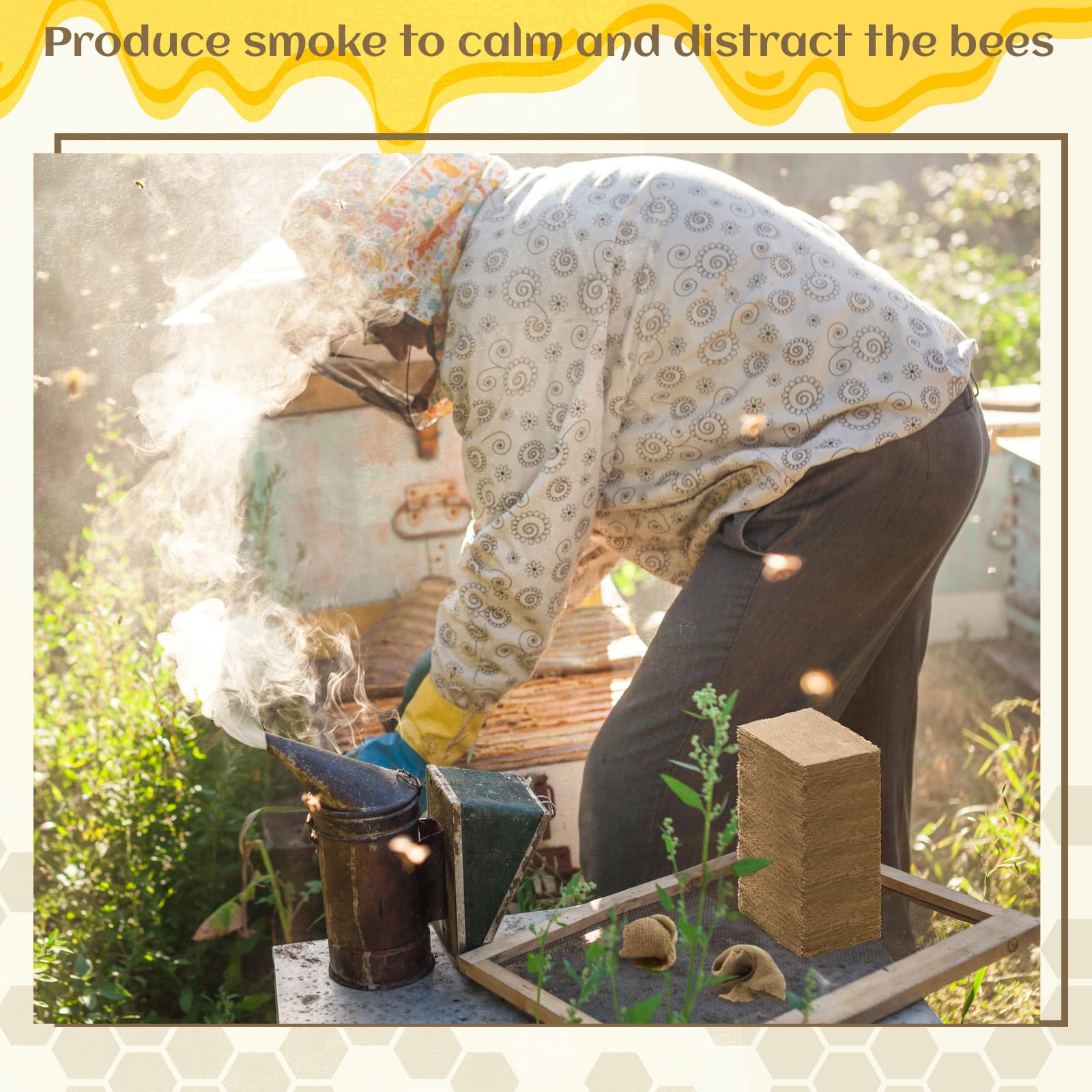 Hahafelt beekeeper using smoker at hive with gentle smoke for calmer colony handling