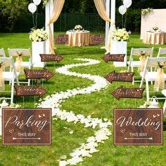 Haiddle arrow signs placed on lawn guiding guests for efficient navigation