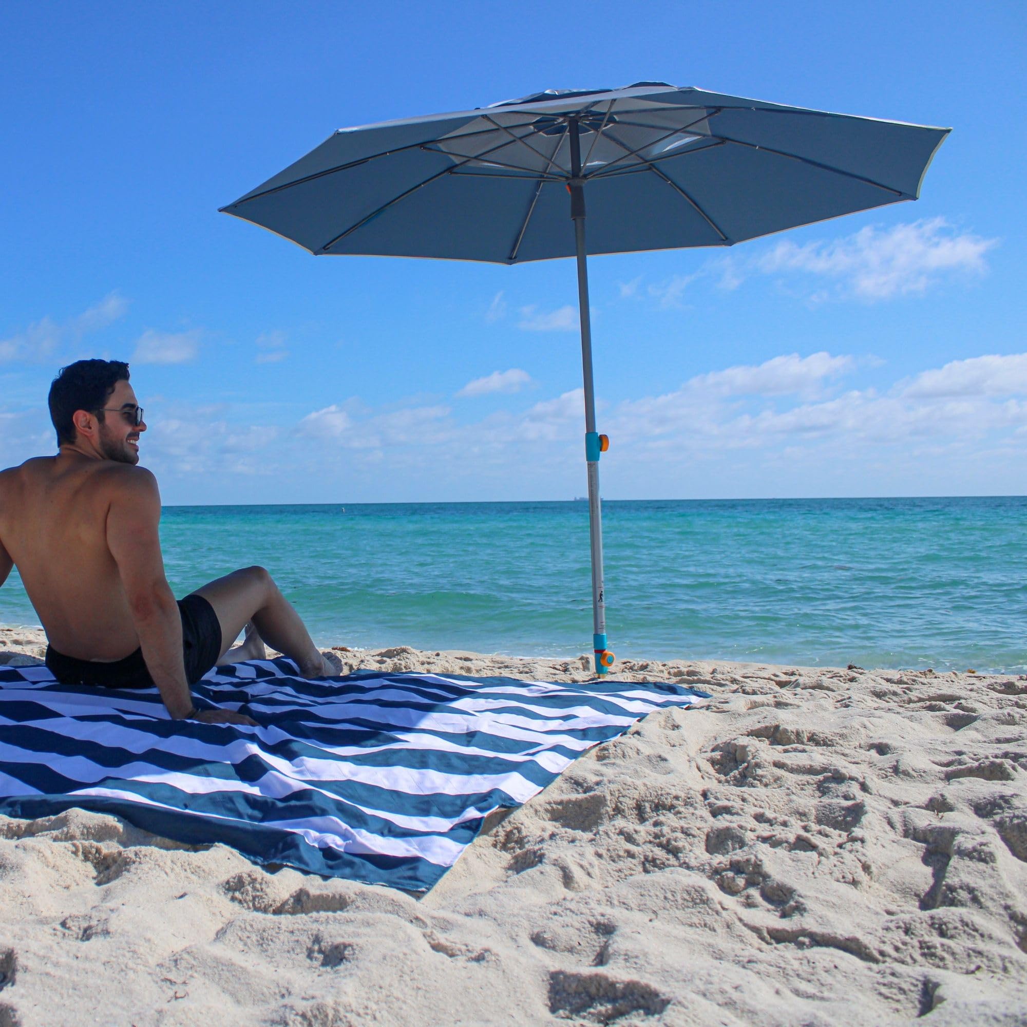 Handy Beach Goods umbrella neatly packed in padded carry bag for easy transport