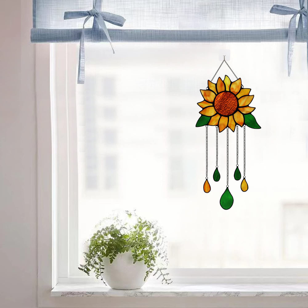 HAOSUM suncatcher hanging in window casting colorful light across the sill for brightening rooms