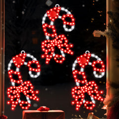 HappyAlley front view of three candy cane lights, bright holiday focal point