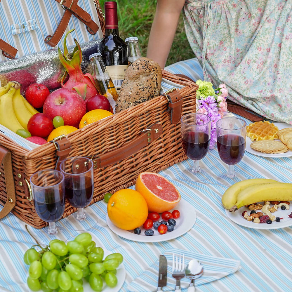 HappyPicnic basket held by hands to show compact transport benefit