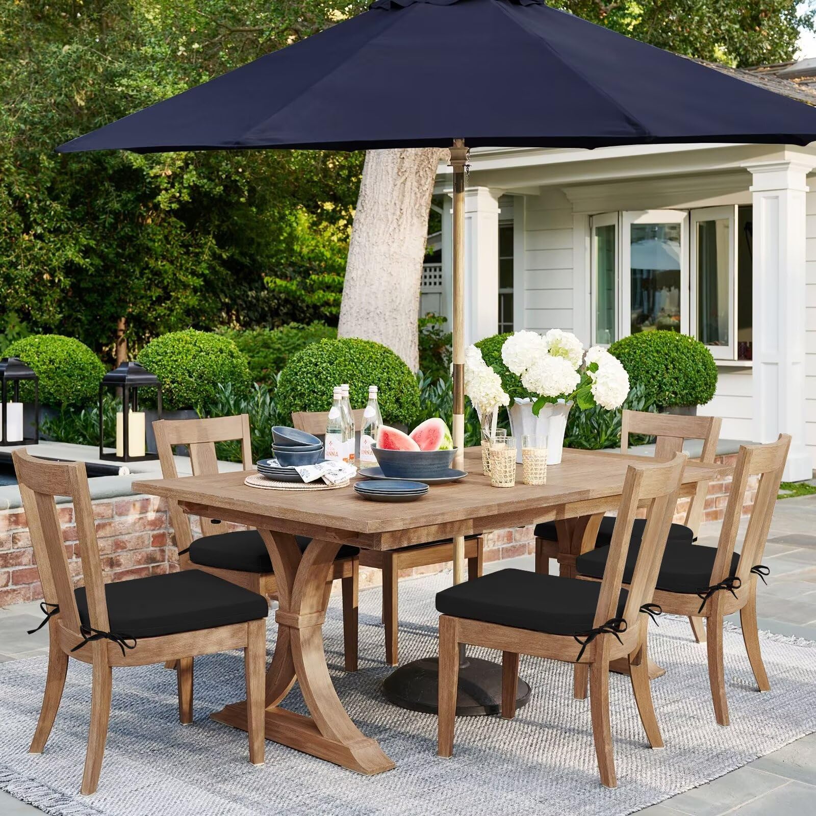 HARBOREST cushions styled on patio table and chairs showing cohesive look