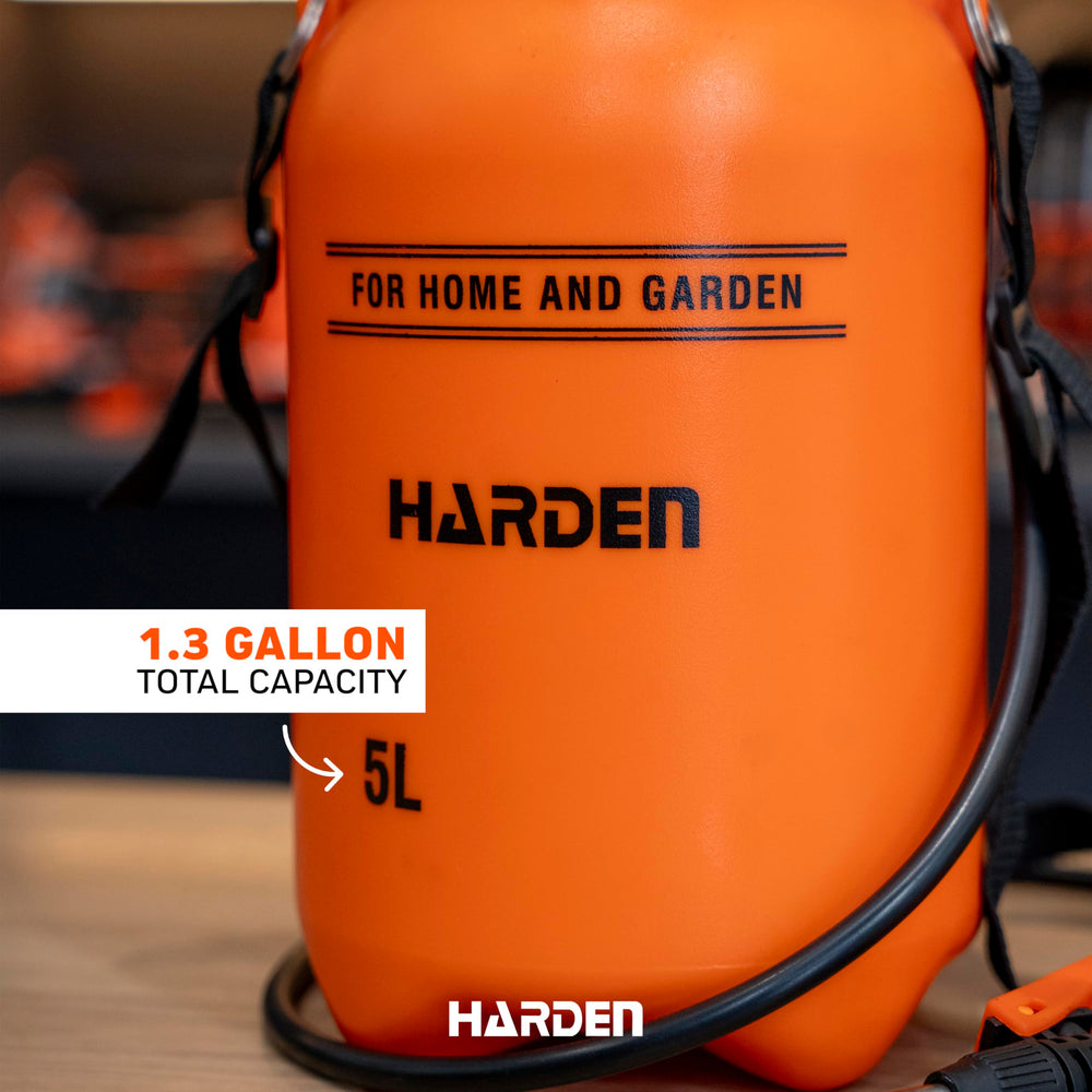 Harden sprayer in use on lawn applying fertilizer with even coverage and reduced refills